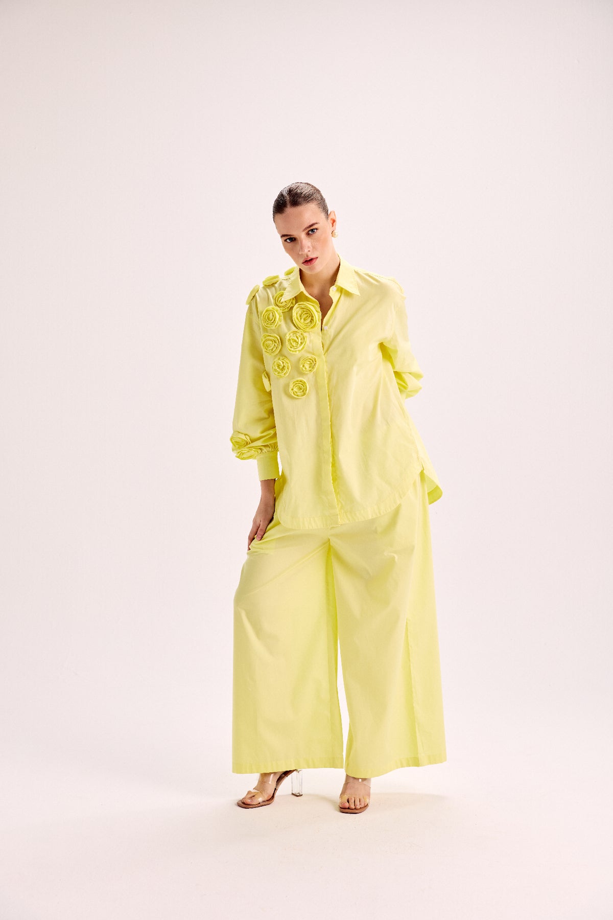 Shirt With Mounted Roses Paired With Loose Fit Pants