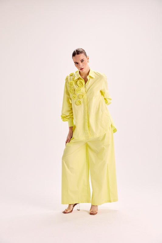 Shirt With Mounted Roses Paired With Loose Fit Pants