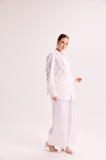 Shirt With Mounted Roses Paired With Loose Fit Pants