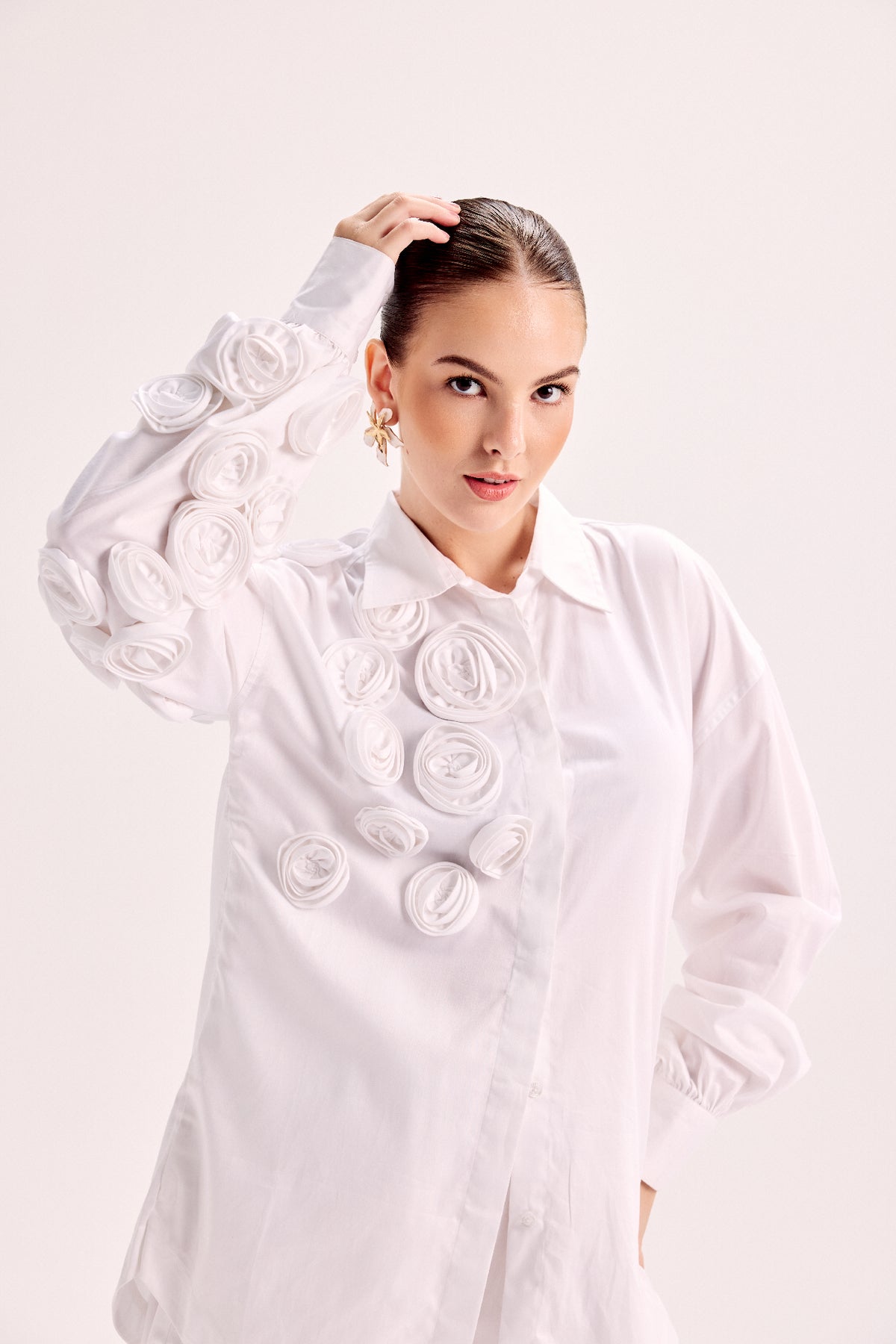Shirt With Mounted Roses Paired With Loose Fit Pants