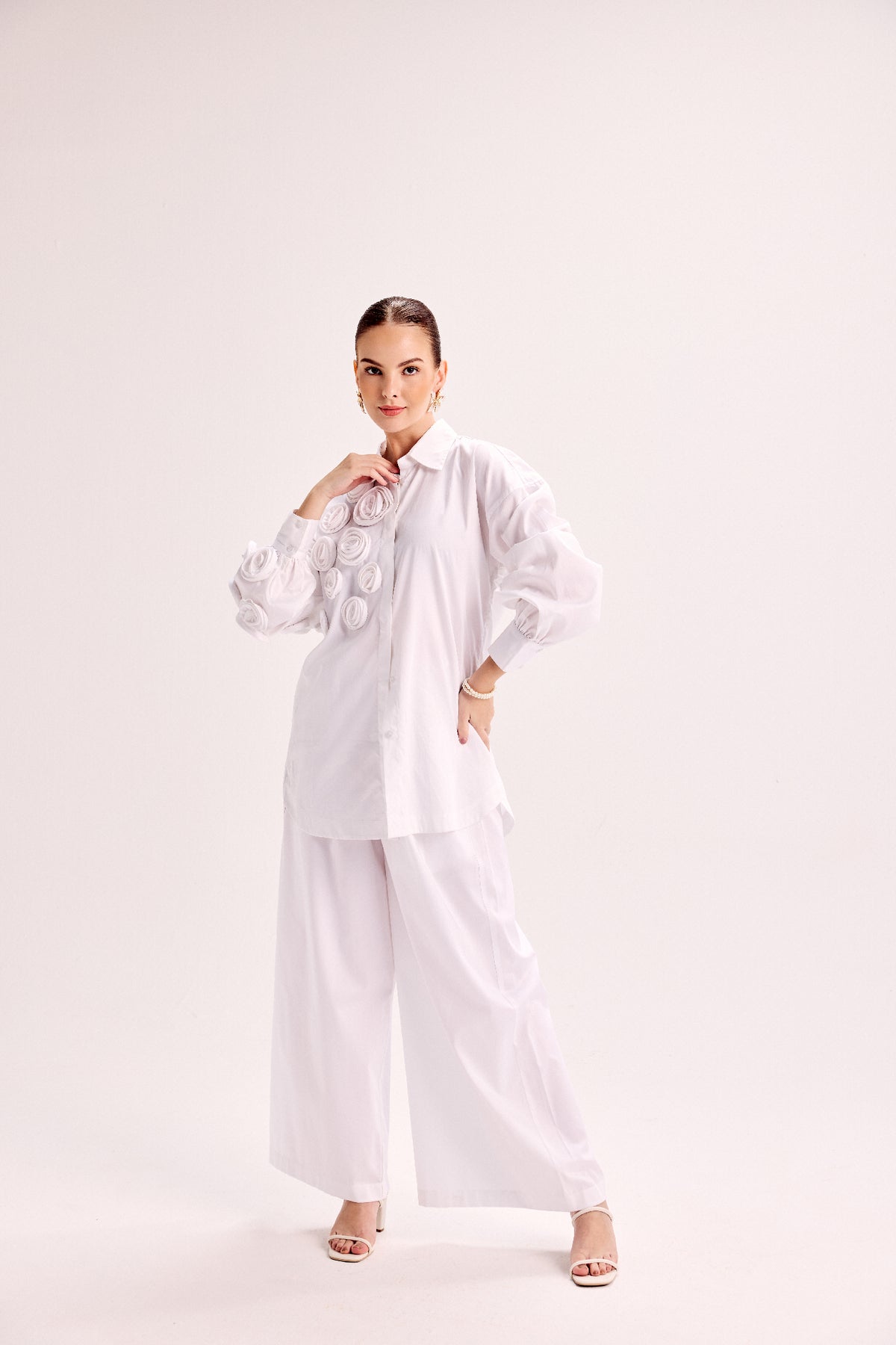 Shirt With Mounted Roses Paired With Loose Fit Pants