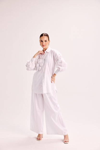 Shirt With Mounted Roses Paired With Loose Fit Pants