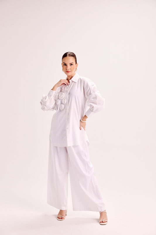 Shirt With Mounted Roses Paired With Loose Fit Pants