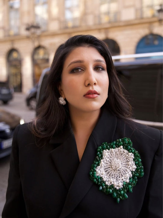 BLACK BLAZER EMBELLISHED WITH HAND EMBROIDERED FLORAL MOTIFS PAIRED WITH FLARED TROUSER