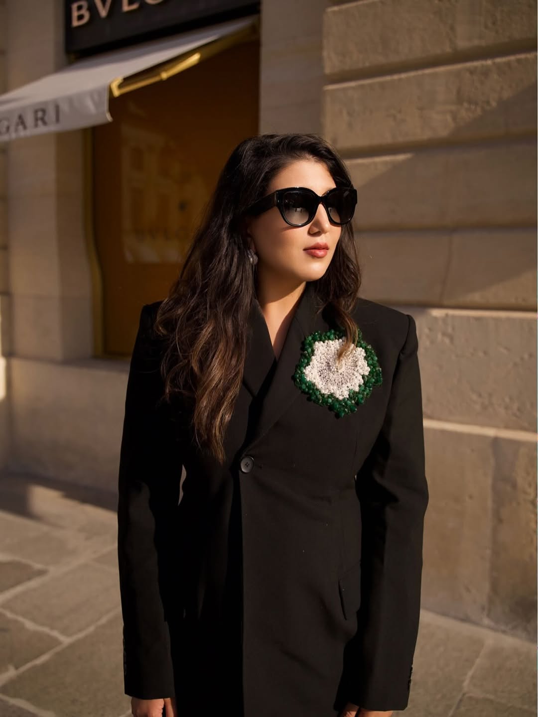 BLACK BLAZER EMBELLISHED WITH HAND EMBROIDERED FLORAL MOTIFS PAIRED WITH FLARED TROUSER
