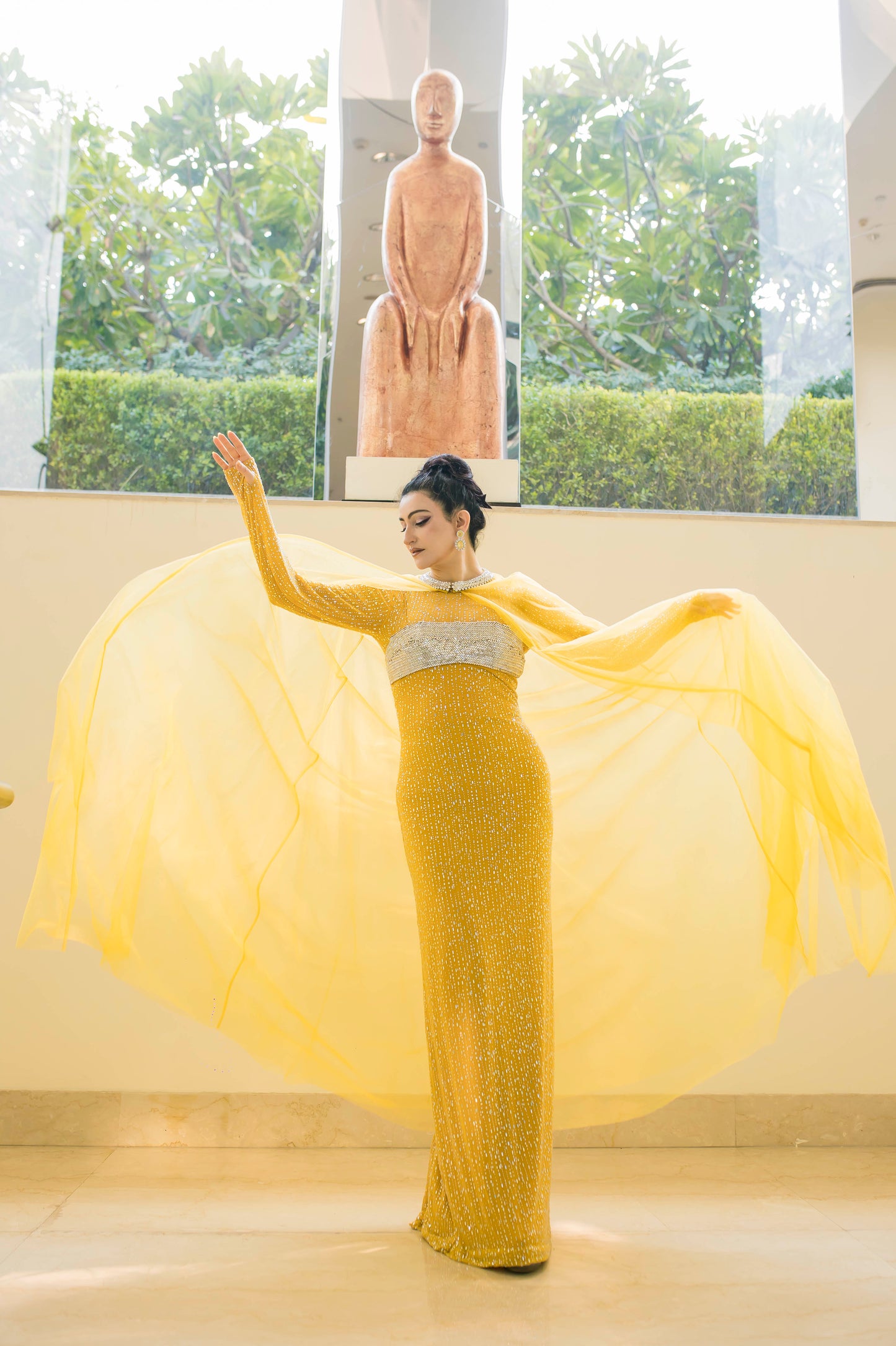 Body-Contouring Sheath Gown With Dramatic Drape