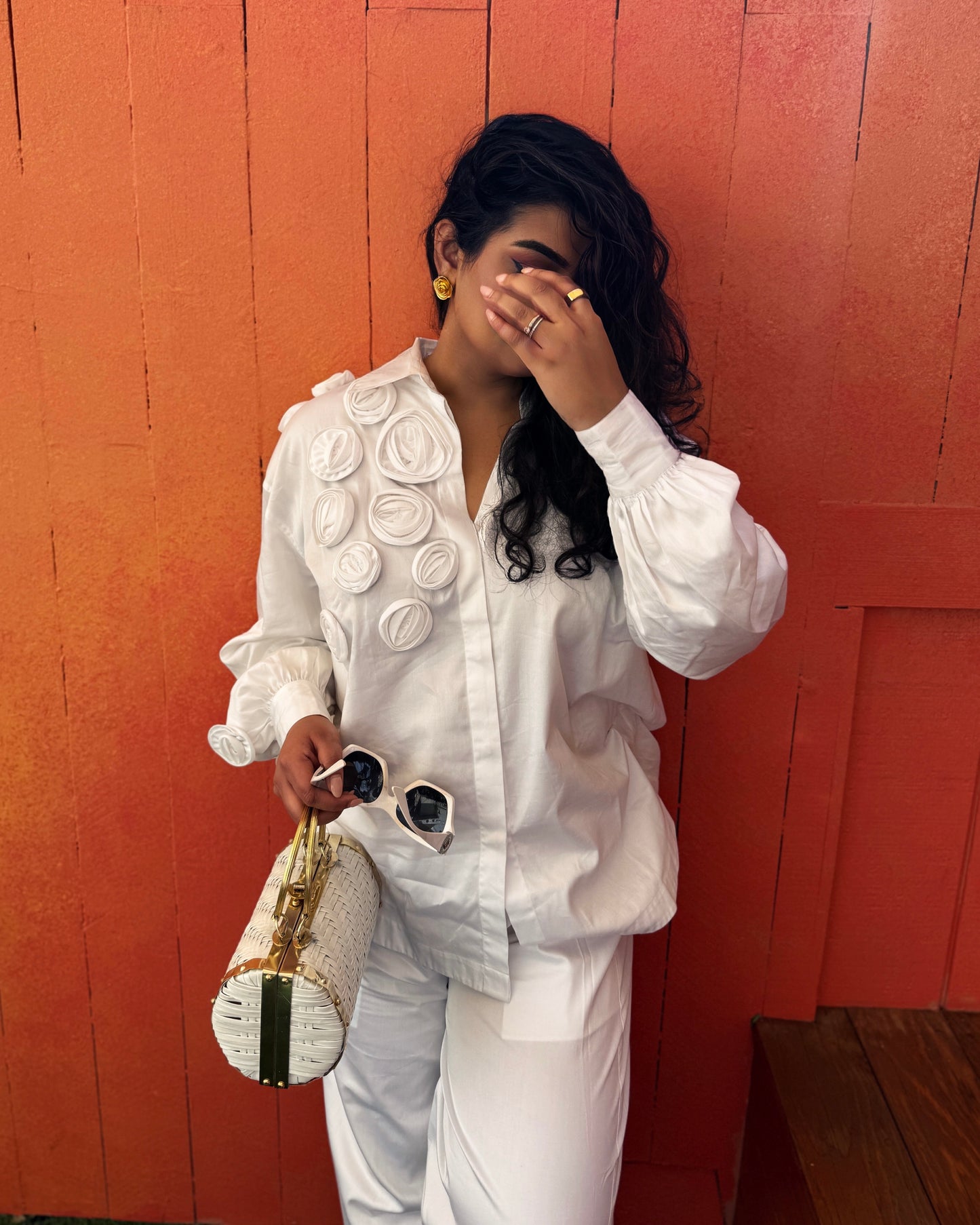 White Shirt With Multiple Roses Paired With Pants