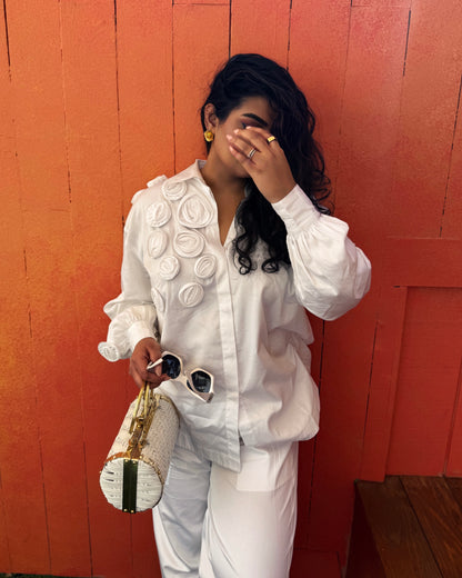 White Shirt With Multiple Roses Paired With Pants